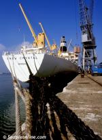 ID 7130 SNOW CRYSTAL (1973/14512grt/IMO 7321075) discharges at the Canary Islands Fruit Terminal, Southampton, England. Flying the flag of the Cook Islands when she was broken up in 2010.